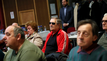Voters listen to Fidesz candidate Denes Galambos at hustings in Ercsi, Hungary (Reuters/Bernadett Szabo)