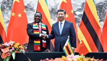 Zimbabwean President Emmerson Mnangagwa shakes hands with Chinese President Xi Jinping (Reuters/Parker Song)