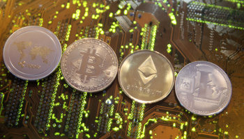 Virtual currencies Ripple, Bitcoin, Etherum and Litecoin (Reuters/Dado Ruvic)