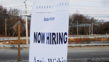 A sign advertises open jobs at an Embassy Suites hotel in Waltham, Massachusetts (Reuters/Brian Snyder)