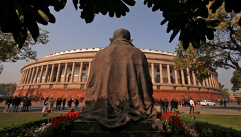 A statue of Mahatma Gandhi outside the Parliament building in Delhi (Reuters/Adnan Abidi)