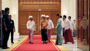 State Counsellor Aung San Suu Kyi greeting President Win Myint (Reuters/Sai Zaw/Pool)