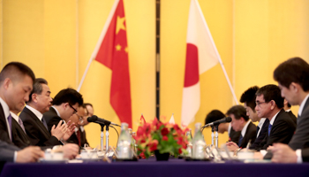 Chinese State Councilor and Foreign Minister Wang Yi, 2nd left, and Japan's Foreign Minister Taro Kono, 2nd right, meet in Tokyo, Japan (Reuters/Behrouz Mehr)