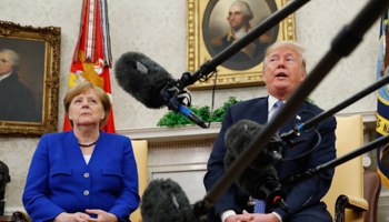 US President Donald Trump meets with German Chancellor Angela Merkel in the White House Oval Office in Washington, US, 2018 (Reuters/Kevin Lamarque)