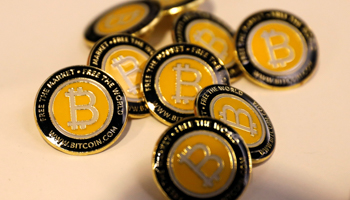 Bitcoin.com buttons displayed at a recent blockchain technology conference in New York (Reuters/Mike Segar)