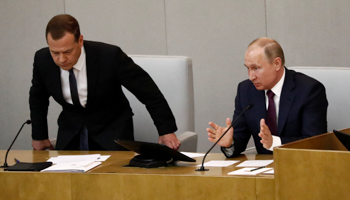 Russian President Vladimir Putin and Prime Minister Dmitry Medvedev (Reuters/Sergei Karpukhin)