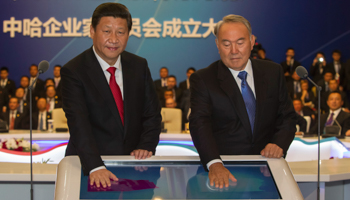 Chinese President Xi Jinping and Kazakhstan's President Nursultan Nazarbayev during a gas pipeline launching ceremony in 2013 (Reuters/Shamil Zhumatov)