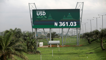 A billboard in Lagos showing the exchange rate of US dollars to Naira, May 15 (Reuters/Akintunde Akinleye)