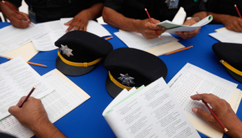 Policemen take psychometric evaluation tests as part of anti-corruption measures (Reuters/Tomas Bravo)