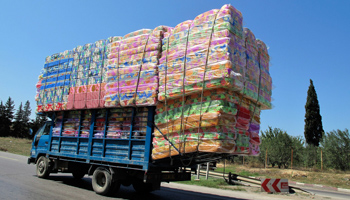 Truck transporting mattresses in Algeria (Reuters/Zohra Bensemra)