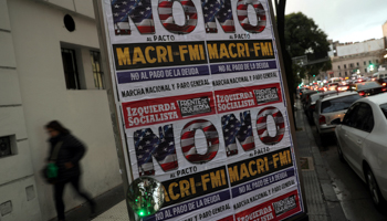 Posters reading "No to the Macri-IMF pact" in Buenos Aires (Reuters/Marcos Brindicci)