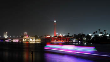 Pleasure boats in front of the Cairo tower in Cairo, June 2018 (Reuters/Amr Abdallah Dalsh)