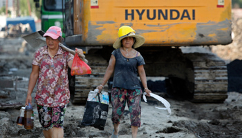 Migrant workers at a construction site in Shanghai (Reuters/Aly Song)