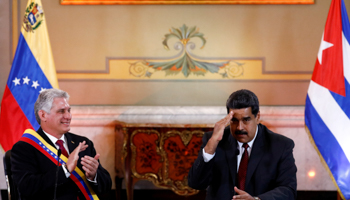 President Nicolas Maduro (right) and Cuban President Miguel Diaz-Canel (Reuters/Marco Bello)