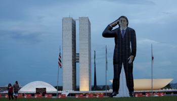 An inflatable image of rightist candidate Jair Bolsonaro in front of the Congress building (Reuters/Ueslei Marcelino)