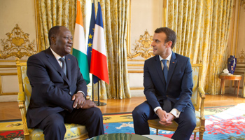 Ivory Coast's President Alassane Ouattara meets with French President Emmanuel Macron (Reuters/Michel Euler)