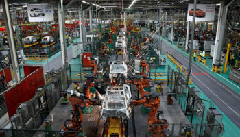 Robots assemble automobiles at the Renault SA car factory in France  (Reuters/Benoit Tessier)
