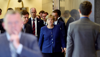 German Chancellor Angela Merkel arrives to take part in an emergency EU summit (Reuters/Eric Vidal)