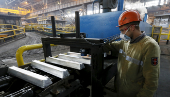 A worker at the Rusal Sayanogorsk aluminium smelter, Sayanogorsk, Russia (Reuters/Ilya Naymushin)