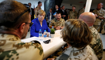 Chancellor Angela Merkel talks with German soldiers (Reuters/Muhammad Hamed)