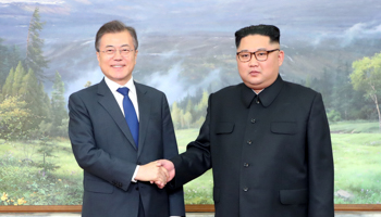 South Korean President Moon Jae-in and North Korean leader Kim Jong Un during their summit at the truce village of Panmunjom in North Korea (Reuters/The Presidential Blue House)