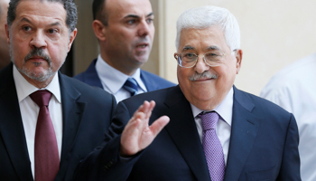 Palestinian President Mahmoud Abbas waves after leaving hospital in Ramallah (Reuters/Mohamad Torokman)