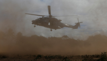 A New Zealand Air Force helicopter landing during co-operative military exercises, July 13, 2017  (Reuters/Jason Reed)