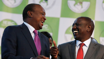 President Uhuru Kenyatta and Deputy President William Ruto celebrate after being declared winners of the 2017 election, August 11, 2017 (Reuters/Thomas Mukoya)