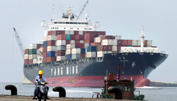 A container ship passes by at Keelung port in Taiwan (Reuters/Pichi Chuang)