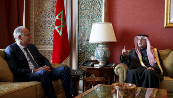 Morocco's Foreign Minister Salaheddine Mezouar (L) speaks with Saudi Arabia's Foreign Minister Adel bin Ahmed Al-Jubeir in Rabat (Reuters/Youssef Boudlal)