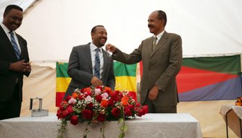 Ethiopian Prime Minister Abiy Ahmed and Eritrean President Isaias Afewerki reopen the Eritrean Embassy in Addis Ababa, July 16, 2018 (Reuters/Tiksa Negeri)