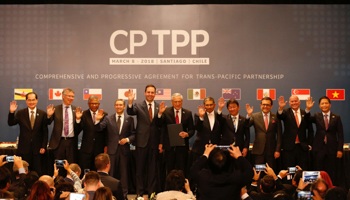 Ministers from member countries after signing the CPTPP (Reuters/Rodrigo Garrido)