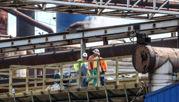 Steel workers return to work at US Steel Granite City Works in Illinois, May 2018 (Reuters/Lawrence Bryant)