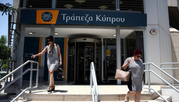 Customers outside a branch of the Bank of Cyprus, Nicosia, June 2016 (Reuters/Yiannis Kourtoglou)