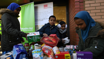 Volunteers at a food bank in London (Reuters/Clodagh Kilcoyne)