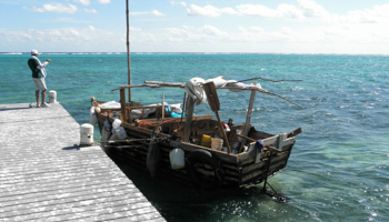 A wooden boat at a dock in George Town, Cayman Islands (Reuters/Peter Polack)