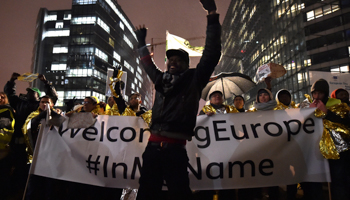A protest in support of a new EU migration policy in Brussels, December 2017 (Reuters/Eric Vidal)
