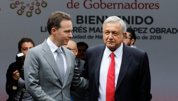 Mexico's President-elect Andres Manuel Lopez Obrador is welcomed by Chiapas Governor Manuel Velasco as he arrives to a meeting with state governors in Mexico City, July 2018 (Reuters/Carlos Jasso)
