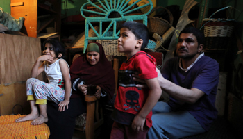 A household with two disabled parents and young children that would benefit from the new social protections programmes (Reuters/Mohamed Abd El Ghany)