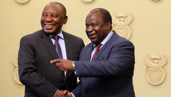 South Africa's President Cyril Ramaphosa (L) with new appointed Finance Minister Tito Mboweni (R) (Reuters/Sumaya Hisham)