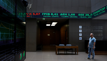A ticker showing stock options at the Athens stock exchange building, August 20 (Reuters/Alkis Konstantinidis)
