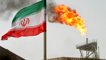 A gas flare on an Iranian oil production platform in the Gulf, July 2005 (Reuters/Raheb Homavandi)
