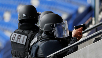 Members of French special police forces of Research and Intervention Brigade (BRI) take part in a drill inside the Groupama Stadium in Decines, near Lyon, as part of a G6 Interior Ministers meeting of the six largest EU countries to discuss security and anti-terror issues, October 9 (Reuters/Emmanuel Foudrot)