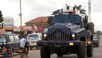 Riot police patrol the streets as Ugandan musician turned politician, Robert Kyagulanyi also known as Bobi Wine arrives from the US in Kampala, Uganda, September 20 (Reuters/Francis Mukasa)
