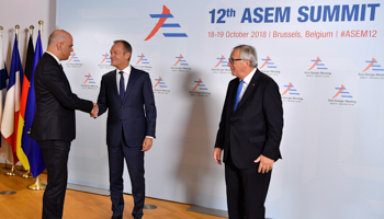 President of the European Commission Jean-Claude Juncker and European Council President Donald Tusk welcome Switzerland's President Alain Berset to the ASEM leaders summit in Brussels, Belgium October 18, 2018 (Reuters/Ben Stansall)