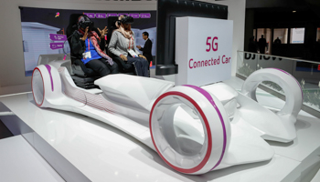 A 5G connected car simulator displayed at the Saudi Telecom Company stand during the Mobile World Congress in Barcelona, Spain, February 27 (Reuters/Yves Herman)