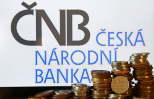 Czech coins in front of the central bank logo (Reuters/David W Cerny)