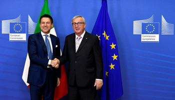 Italian Prime Minister Giuseppe Conte and European Commission President Jean-Claude Juncker (Reuters/Piroschka van de Wouw)
