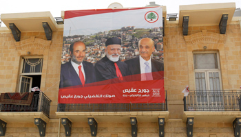 Samir Geagea and another parliamentary candidate appear on a poster alongside the Maronite patriarch, May 2018 (Reuters/Aziz Taher)