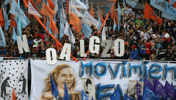 An anti-capitalist rally in Buenos Aires with signs reading "No to the G20" and "Evita Movement" (Reuters/Agustin Marcarian)